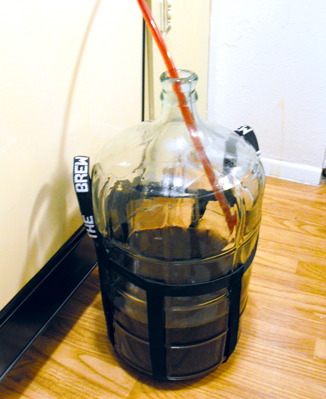 Carboy Being Filled With Wine
