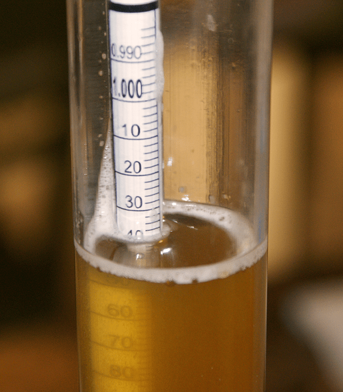 Digital thermometer in beaker of water, close-up available as