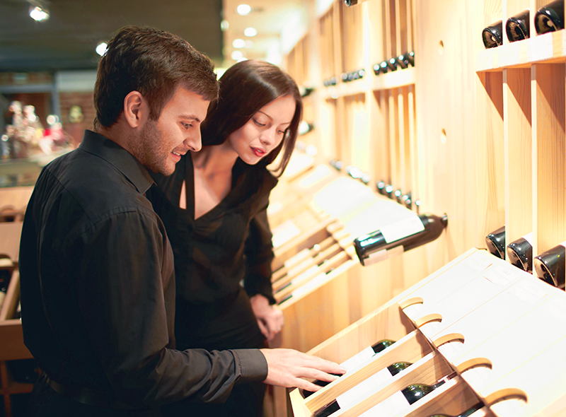 Buy Couple Shopping For Wine