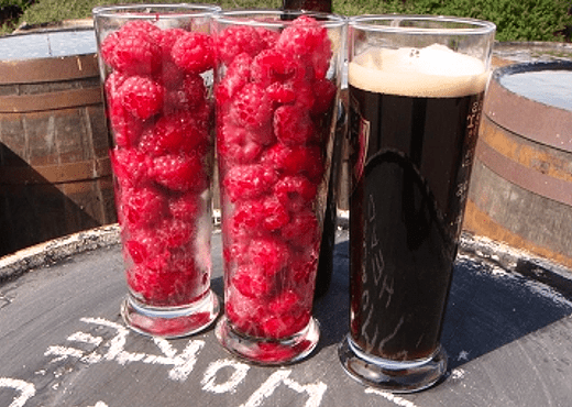 Glasses Of Raspberries With Glass Of Porter