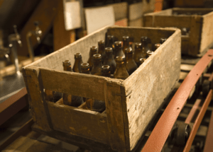 Old wooden case of beer bottles