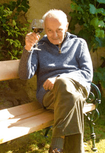 old man drinking wine