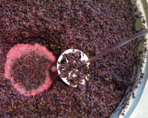 stirring fermenting wine