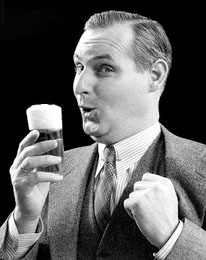 Man Holding Glass Of Homebrew Beer