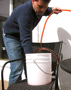 Winemaker Racking Wine